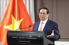越南政府总理范明政会见越南驻澳大利亚大使馆工作人员和旅澳越侨代表