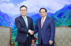 越南政府总理范明政会见韩国和老挝驻越大使