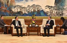 越南政府副总理陈流光会见中国外交部长王毅
