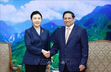 越南政府总理范明政会见中国司法部长贺荣