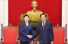 越共中央内政部部长潘廷镯会见中国司法部长贺荣