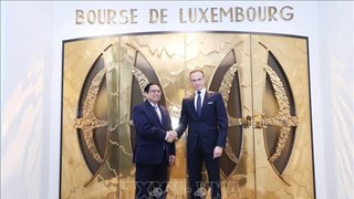 范明政总理走访卢森堡证券交易所