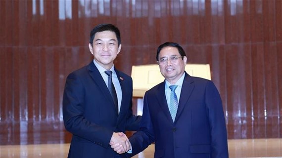  越南政府总理范明政会见新加坡国会议长陈川仁