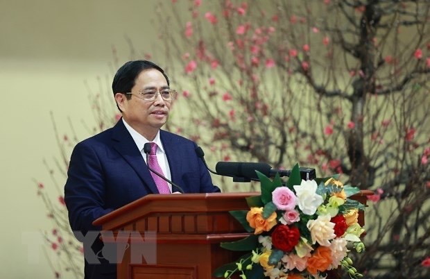 范明政总理相信银行行业在2023年将取得更好的成效 hinh anh 2