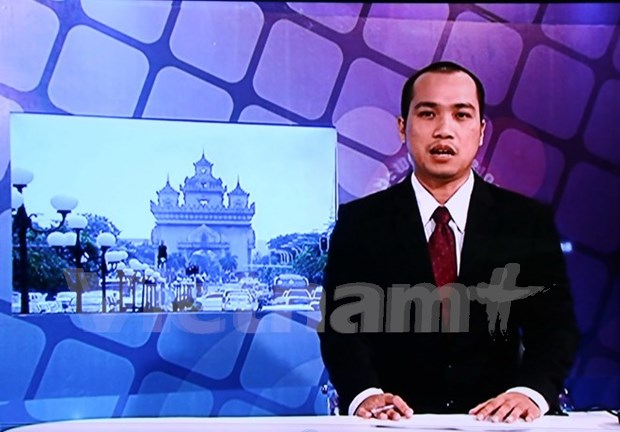 老挝国家电视台越南语新闻节目正式开播 hinh anh 1