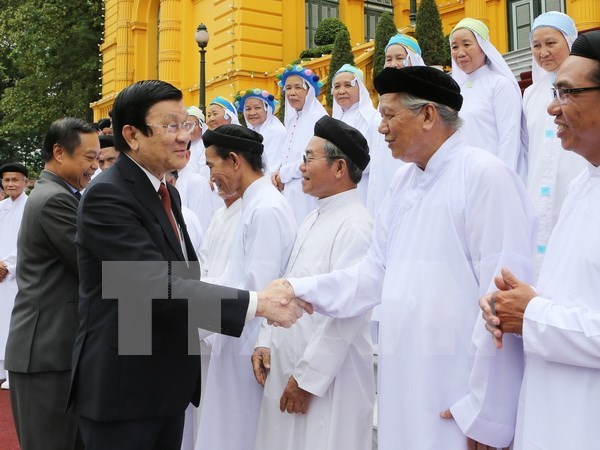 越南国家主席会见高台教圣会人士 hinh anh 1