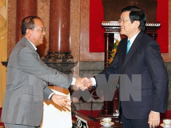 越南国家主席会见老挝司法部高级代表团 hinh anh 1