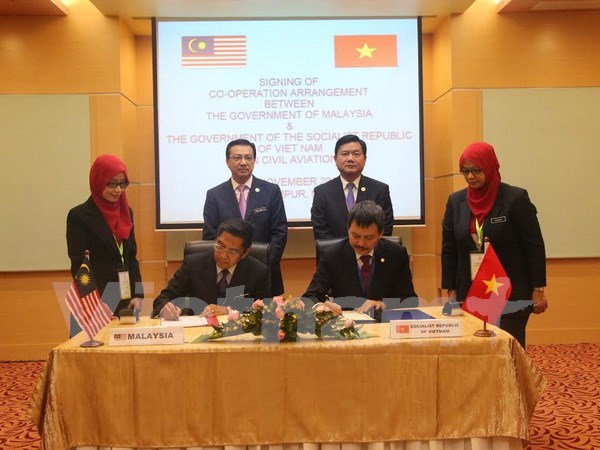 越南与马来西亚签署民航领域合作协议 hinh anh 1