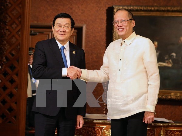 越南国家主席张晋创同菲律宾总统阿基诺三世举行会谈 hinh anh 1