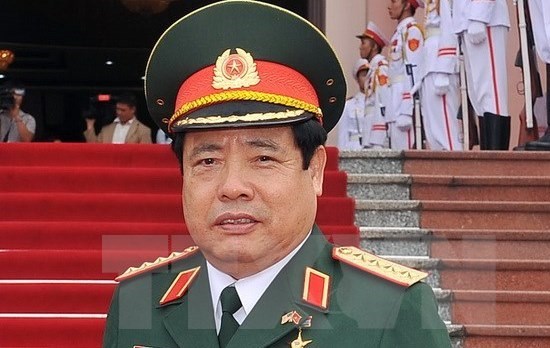 越南国防部长冯光清大将会见柬埔寨内政部国务秘书艾桑安 hinh anh 1