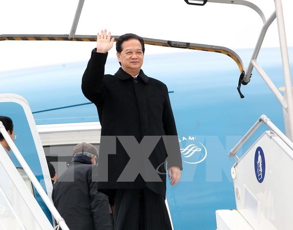 越南政府总理阮晋勇赴法国出席第21届联合国气候变化大会 hinh anh 1