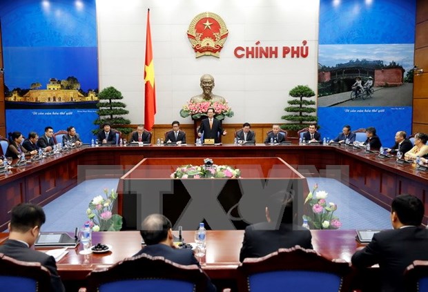 越南政府总理：政府和企业需要同心协力 发挥内力和提高竞争力 hinh anh 1