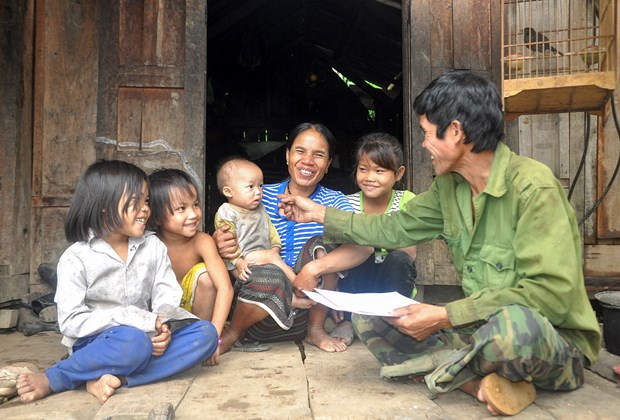 政府总理批准“为从老挝回国的越南自由移民者安置”方案 hinh anh 1