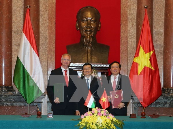 越南国家主席张晋创主席《越南与匈牙利刑事司法协助协定》签署仪式 hinh anh 1