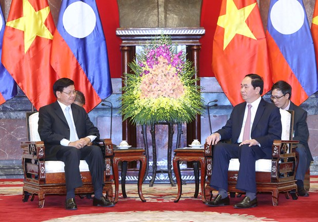 越南国家主席陈大光会见老挝总理通伦·西苏里 hinh anh 1