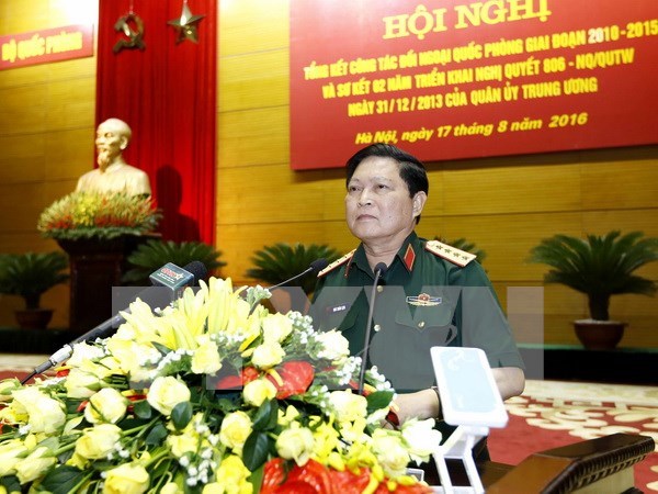 越南军事高级代表团对中国进行正式友好访问 hinh anh 1