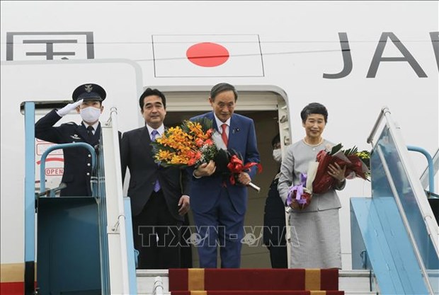 日本首相菅义伟圆满结束对越南的正式访问 hinh anh 1