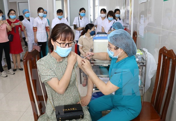 国际媒体：越南为何 “击败”新冠肺炎疫情？ hinh anh 1
