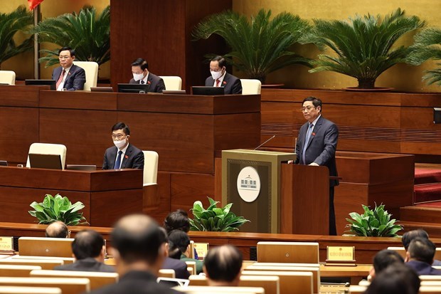 越南总理范明政：预计2021年完成12项既定指标中的8项指标 hinh anh 1