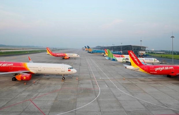 重新开放国际航线 助力越南航空公司减少亏损增加营收 hinh anh 1