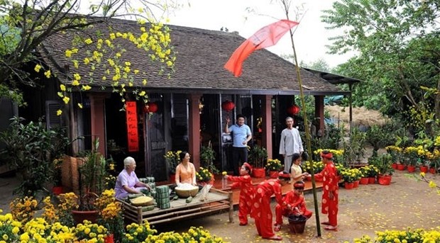 越南民族传统春节的插春幡子 hinh anh 1