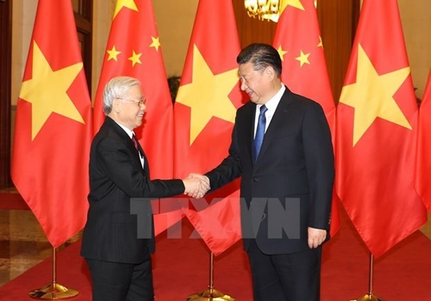 越中两国领导人互致贺电庆祝两国建交67周年 hinh anh 1