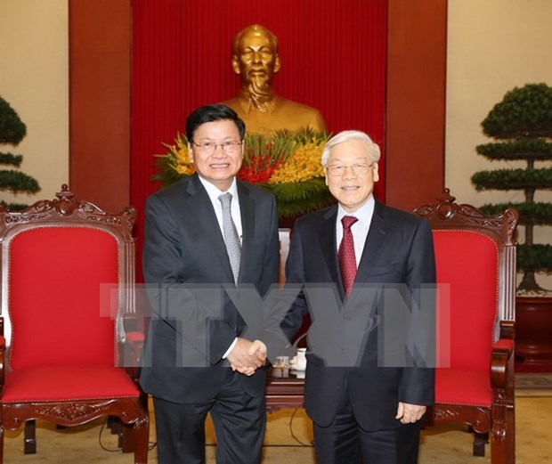 越共中央总书记阮富仲会见老挝政府总理通伦·西苏里 hinh anh 1
