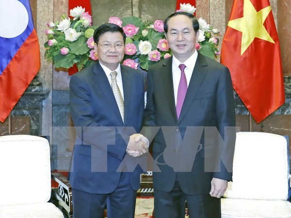 越南国家主席陈大光会见老挝总理通伦·西苏里 hinh anh 1