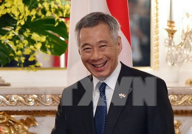 新加坡总理李显龙与夫人开始对越南进行正式访问 hinh anh 1