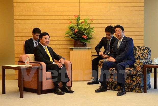 越南政府副总理兼外交部长范平明对日本进行工作访问 hinh anh 1