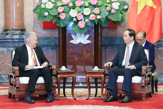 越南国家主席陈大光会见加拿大和印尼客人 hinh anh 3