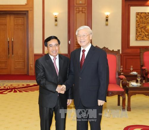 越南党和国家领导人分别会见老挝国家副主席潘坎•维帕万 hinh anh 2