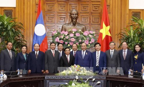 越南党和国家领导人分别会见老挝国家副主席潘坎•维帕万 hinh anh 6