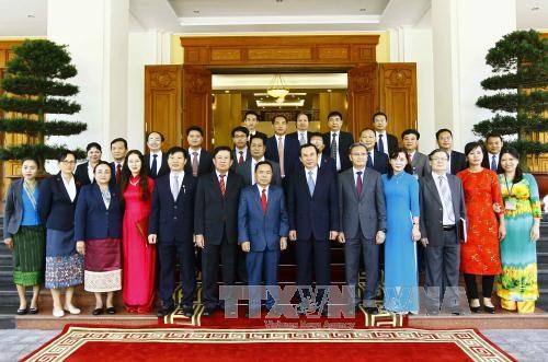 越共中央办公厅与老挝人民革命党中央办公厅加强合作 hinh anh 1