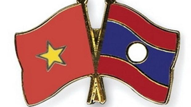 “老挝安全部与越南公安部间合作关系”图片展在老挝万象正式开幕 hinh anh 1