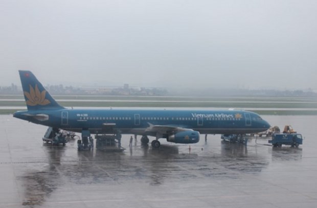 越南航空公司、越捷航空公司因受第十二号台风影响调整航班执行计划 hinh anh 1