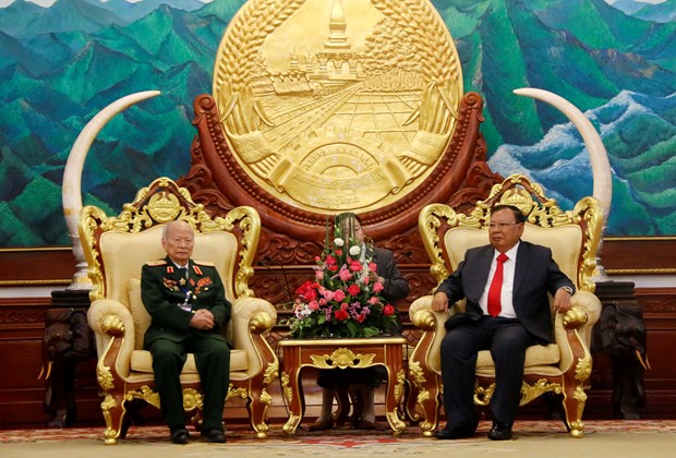 老挝领导人高度评价越南援老志愿军和军事专家的巨大贡献 hinh anh 1