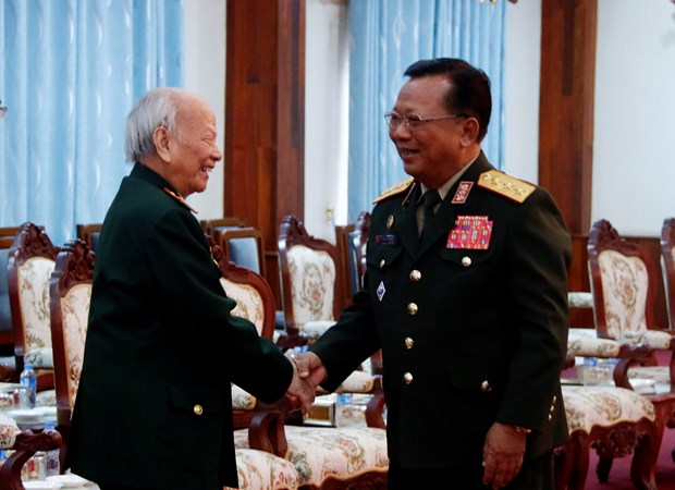 老挝领导人高度评价越南援老志愿军和军事专家的巨大贡献 hinh anh 3