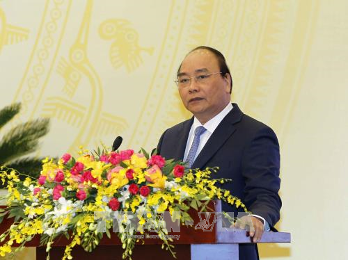 政府总理阮春福：提高单位领导人和个人在落实2018年经济社会任务的责任意识 hinh anh 2