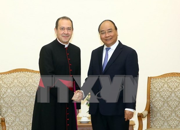 梵蒂冈圣座国务院副秘书长卡米莱里访问越南 hinh anh 1