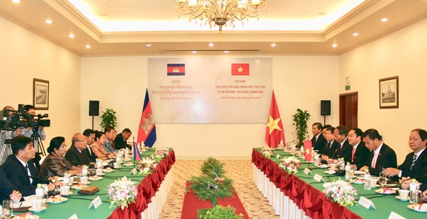 越南与柬埔寨加强宗教管理工作的合作力度 hinh anh 2