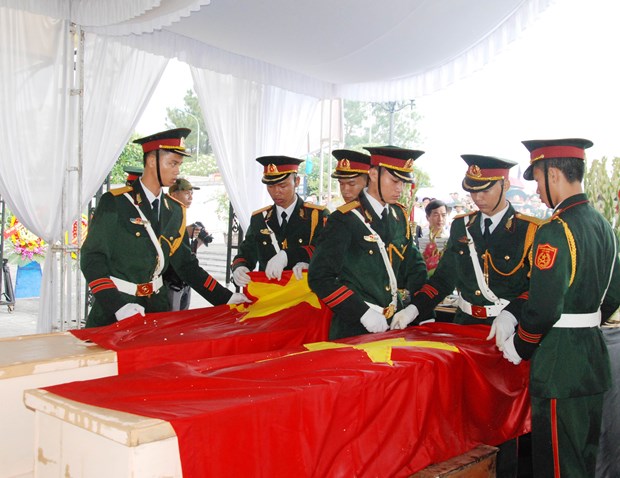 深切哀悼在老挝牺牲的越南志愿军烈士 hinh anh 1
