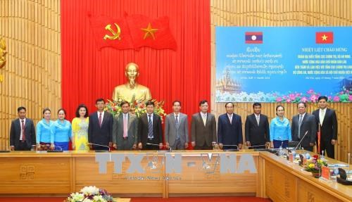 越南公安部同老挝安全部加强群众团体工作的合作 hinh anh 2