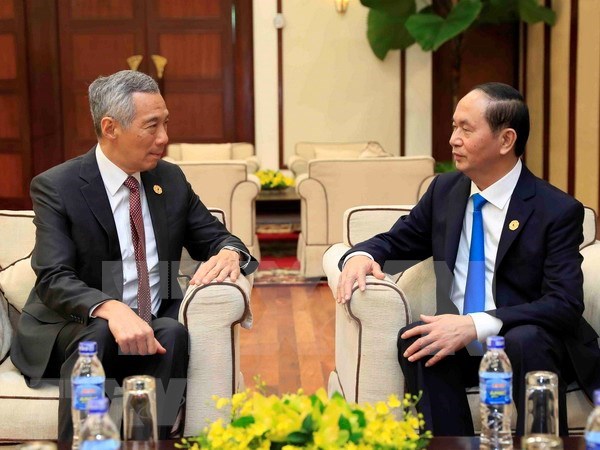 越南与新加坡建交45周年 越南领导人向新方致贺信 hinh anh 1