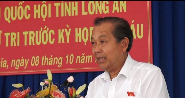 越南政府常务副总理张和平会见隆安省选民 hinh anh 1