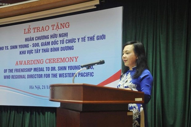 世界卫生组织西太平洋地区主任荣获越南友谊勋章 hinh anh 2