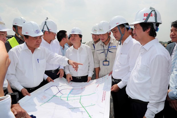 越南政府总理要求为在和乐的河内国家大学建设规划项目解决困难 hinh anh 1