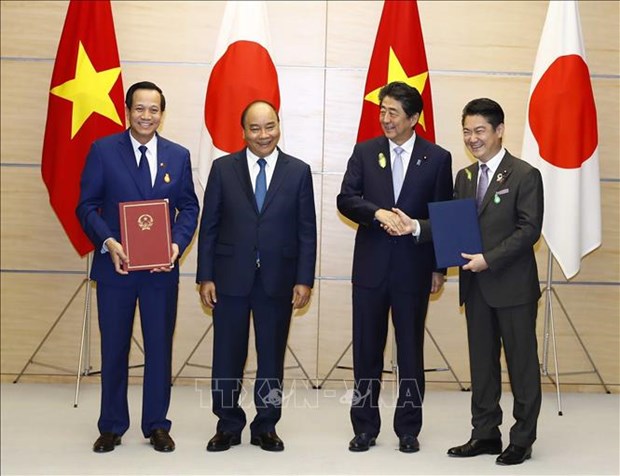 越南与日本交换合作备忘录 促进劳务领域合作 hinh anh 1