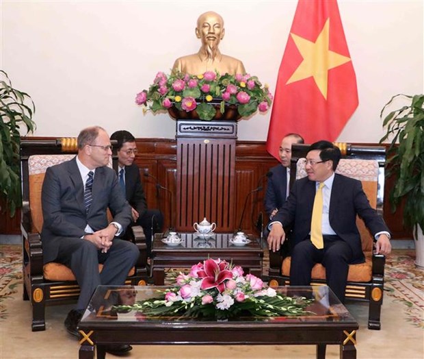 越南政府副总理范平明会见德国驻越大使克里斯蒂安·伯杰 hinh anh 2