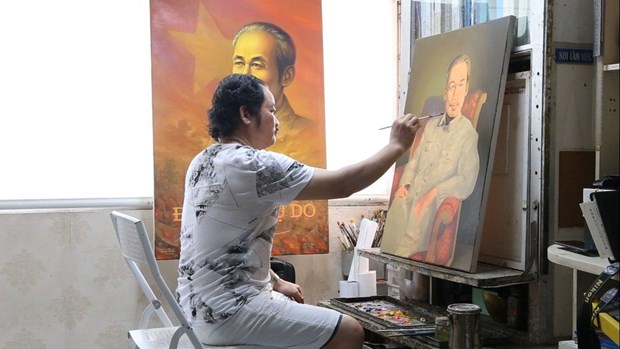 绘制2000幅胡志明主席肖像画的画家 hinh anh 2
